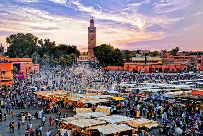 Marrakech-Attractions-People-visit-the-Jemaa-el-Fna-Square-at-sunset