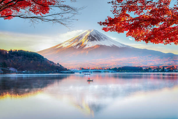 Fisherman Boat with Fuji Moutnain bacgkround in Morning Mist Autumn, Kawaguchikok Lake, Japan